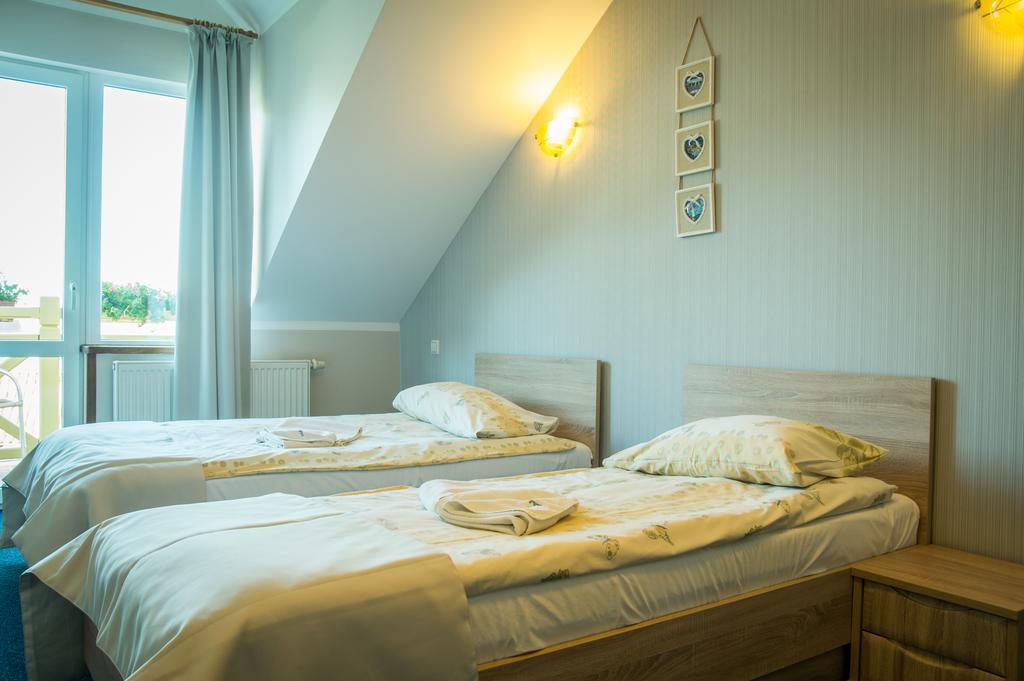 Bed and Breakfast Sloneczny Port Миколайки Номер фото